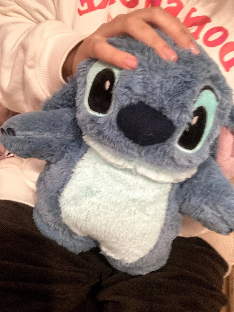 Stitch para Cólicas: Garrafa Aquecedora de Mão para Alívio e Aconchego!